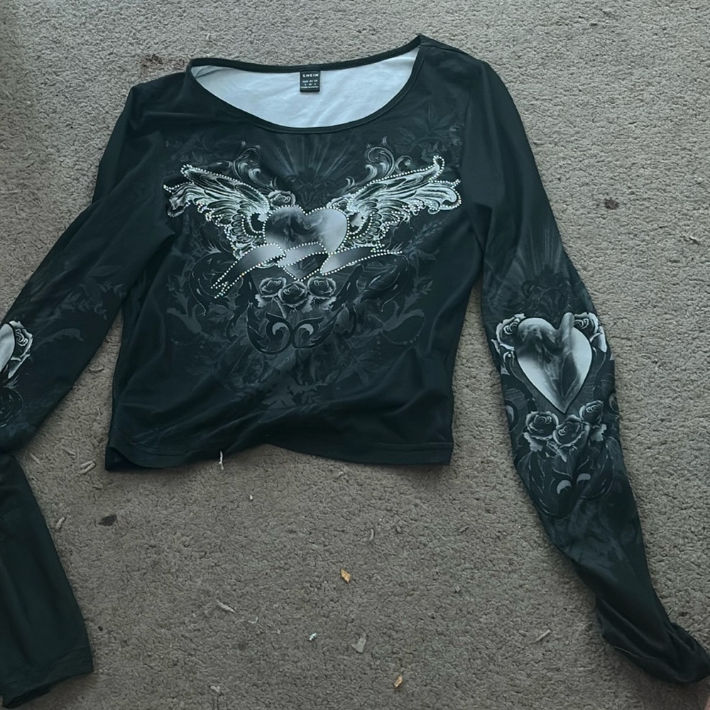 black long sleeve with cute sequin heart with wings and hearts on sleeves